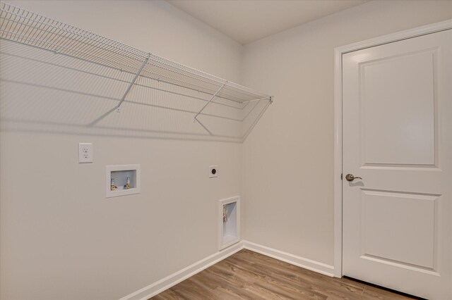 909 Kay Pl, Grovetown, GA 30813 - laundry area with electric dryer hookup, wood finished floors, and washer hookup