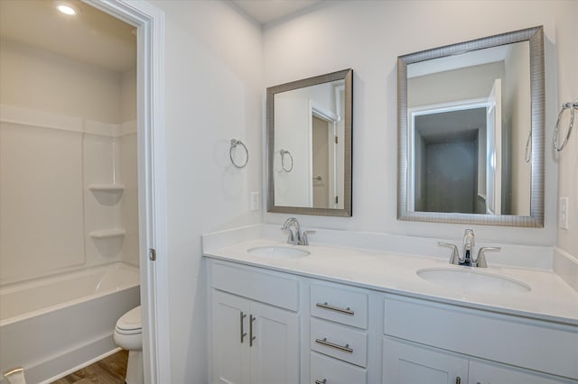 909 Kay Pl, Grovetown, GA 30813 - bathroom featuring double vanity, tub / shower combination, and wood finished floors