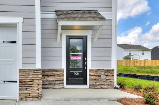 909 Kay Pl, Grovetown, GA 30813 - property entrance featuring stone siding and roof with shingles