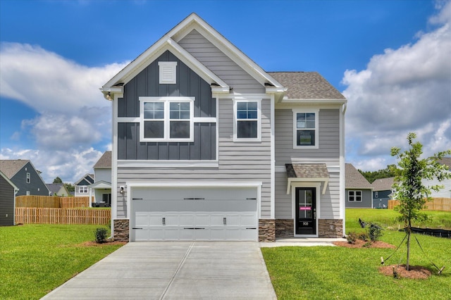 909 Kay Pl, Grovetown, GA 30813 - craftsman house with board and batten siding, stone siding, concrete driveway, and a garage