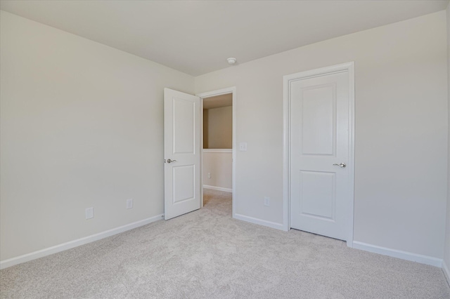 909 Kay Pl, Grovetown, GA 30813 - unfurnished bedroom with light colored carpet and baseboards