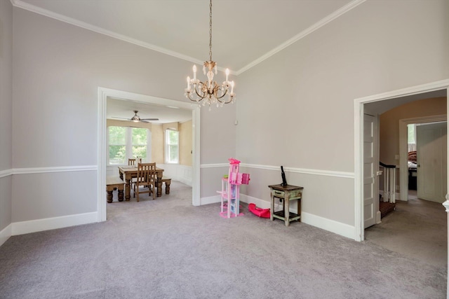 rec room with ornamental molding, carpet, ceiling fan with notable chandelier, and lofted ceiling