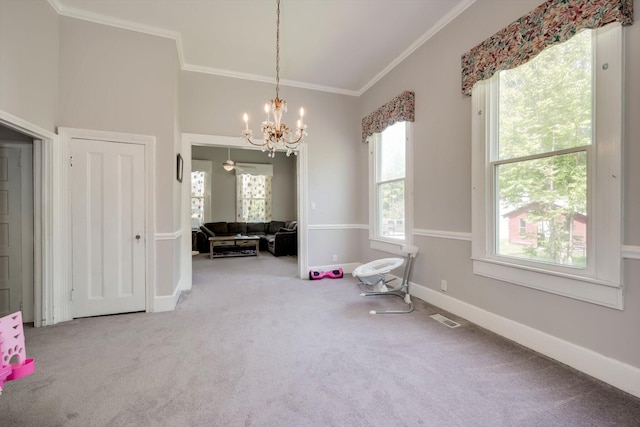 interior space featuring crown molding, a notable chandelier, visible vents, and baseboards