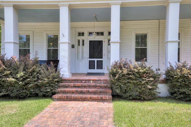 entrance to property with a porch