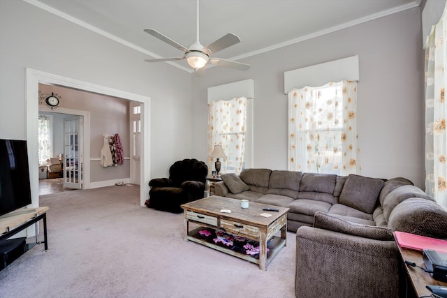 living room featuring crown molding, ceiling fan, carpet floors, and french doors