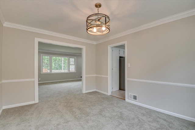 986 Campbellton Dr, North Augusta, SC 29841 - unfurnished room featuring carpet floors, crown molding, and a chandelier