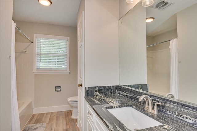 986 Campbellton Dr, North Augusta, SC 29841 - bathroom with vanity, wood finished floors, and shower / bath combination with curtain