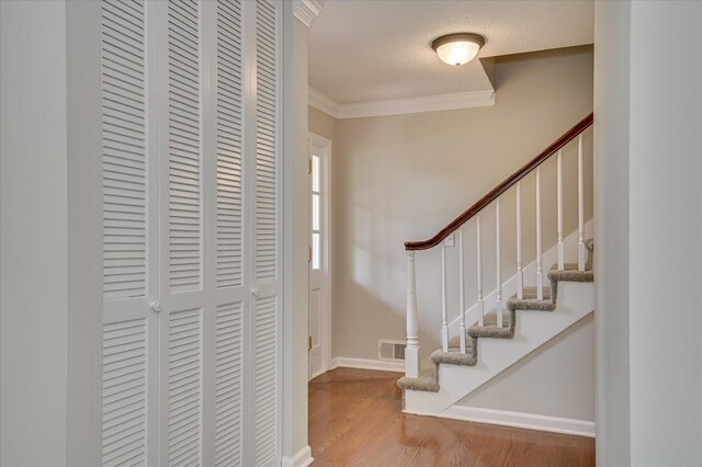 986 Campbellton Dr, North Augusta, SC 29841 - entrance foyer with ornamental molding, stairs, and wood finished floors