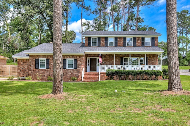 986 Campbellton Dr, North Augusta, SC 29841 - view of front of property with brick siding, a porch, and roof with shingles