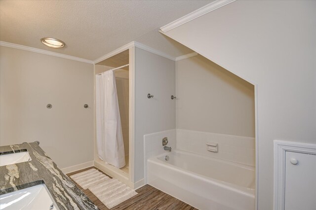 986 Campbellton Dr, North Augusta, SC 29841 - full bathroom featuring a bath, a shower stall, a textured ceiling, wood finished floors, and crown molding