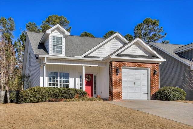 view of front facade with a garage and a front lawn