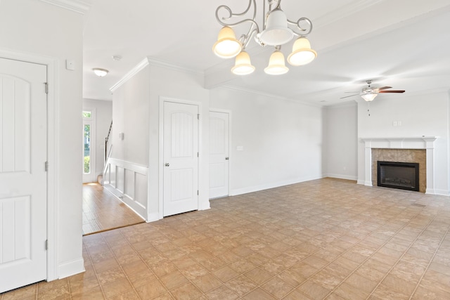 207 Hazelwood Ct, Grovetown, GA 30813 - unfurnished living room featuring a ceiling fan, a chandelier, a tiled fireplace, and crown molding