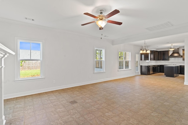 207 Hazelwood Ct, Grovetown, GA 30813 - unfurnished living room with ceiling fan, baseboards, ornamental molding, and a sink