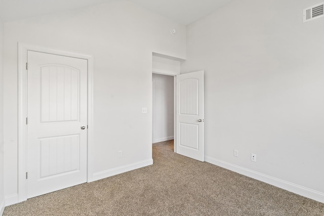 207 Hazelwood Ct, Grovetown, GA 30813 - unfurnished bedroom featuring carpet, baseboards, and vaulted ceiling