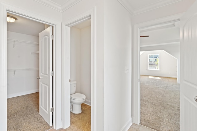 207 Hazelwood Ct, Grovetown, GA 30813 - bathroom with ornamental molding, toilet, baseboards, and a walk in closet