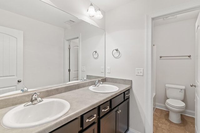 207 Hazelwood Ct, Grovetown, GA 30813 - bathroom with double vanity, baseboards, toilet,  shower combination, and tile patterned flooring