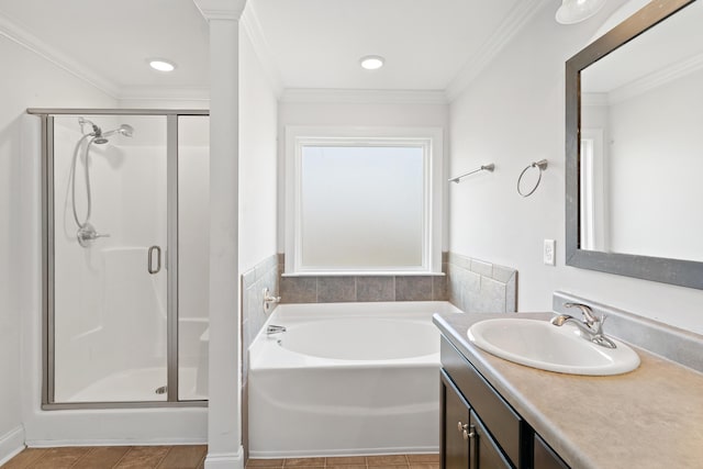 207 Hazelwood Ct, Grovetown, GA 30813 - full bathroom featuring a stall shower, vanity, a garden tub, tile patterned flooring, and ornamental molding