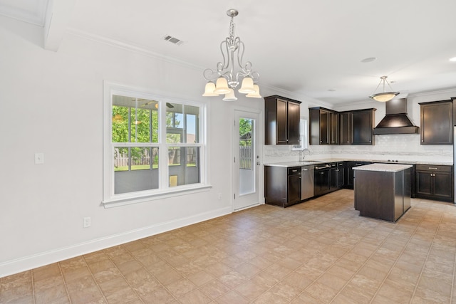 207 Hazelwood Ct, Grovetown, GA 30813 - kitchen with premium range hood, a sink, light countertops, backsplash, and crown molding