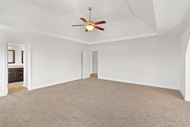 207 Hazelwood Ct, Grovetown, GA 30813 - unfurnished bedroom with a raised ceiling, light colored carpet, baseboards, ornamental molding, and connected bathroom