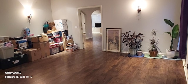 interior space with dark wood-type flooring