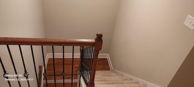 staircase with baseboards