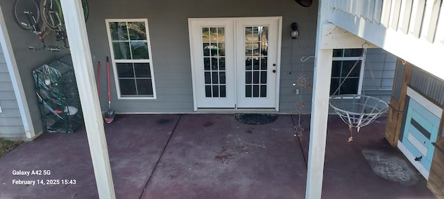 doorway to property with french doors and a patio area