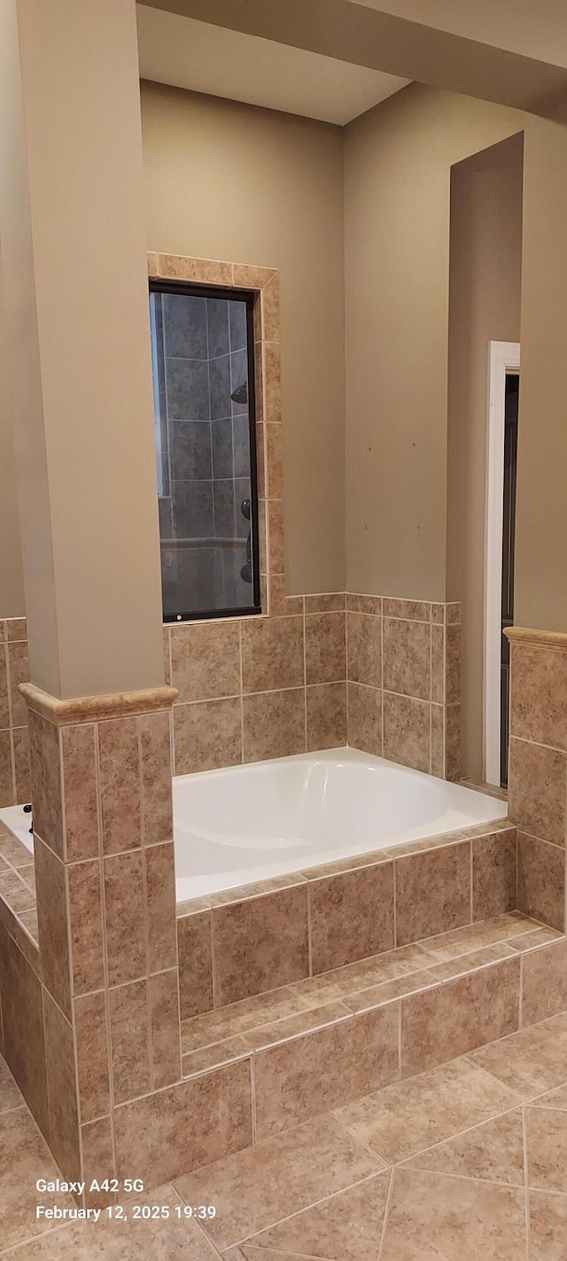 bathroom featuring a garden tub