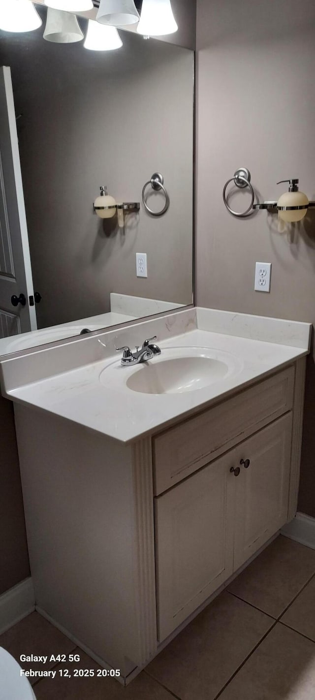 bathroom featuring vanity and tile patterned floors