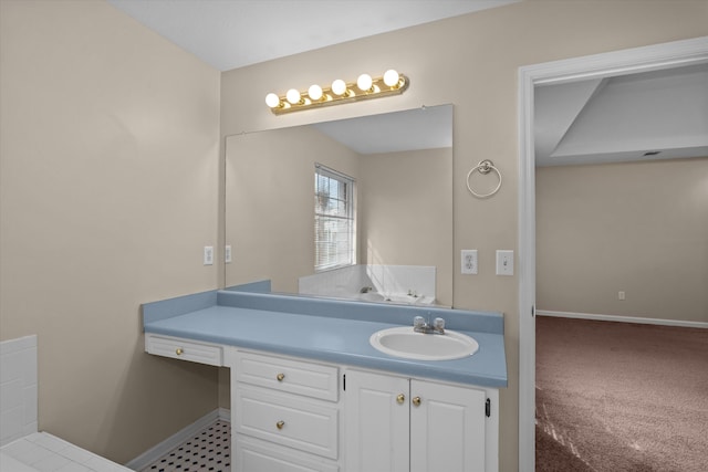 bathroom featuring vanity and baseboards