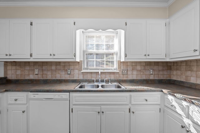 kitchen with dishwasher, dark countertops, white cabinets, and a sink