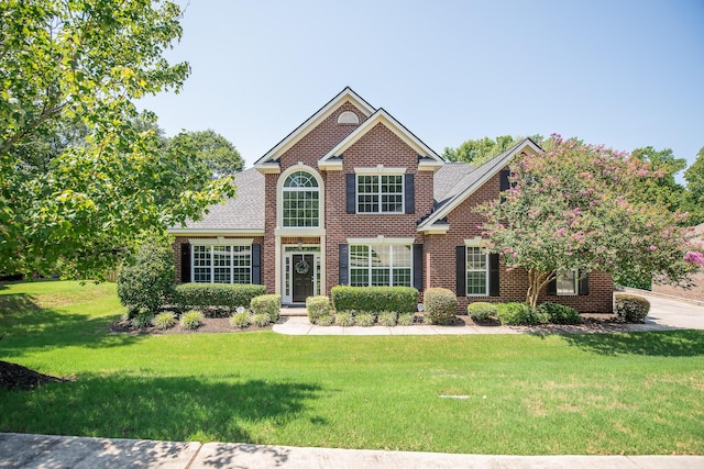 view of front facade with a front lawn