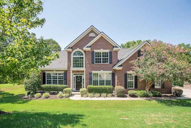 view of front of home with a front yard