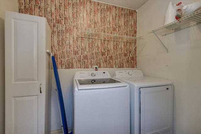 laundry area featuring washer and clothes dryer