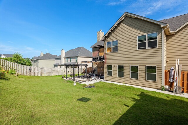 220 Dripping Rock Pass, Grovetown, GA 30813 - rear view of house with a pergola, a patio area, a chimney, and a fenced backyard
