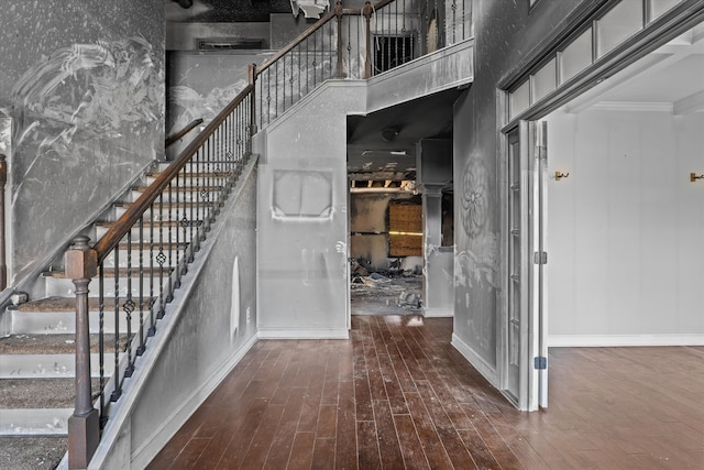 220 Dripping Rock Pass, Grovetown, GA 30813 - stairway featuring wood finished floors, crown molding, and a high ceiling