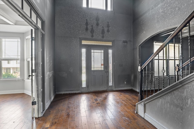 220 Dripping Rock Pass, Grovetown, GA 30813 - foyer entrance featuring a high ceiling, stairway, hardwood / wood-style floors, and arched walkways