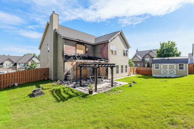 220 Dripping Rock Pass, Grovetown, GA 30813 - back of house featuring a pergola, a storage shed, a fenced backyard, a patio, and a chimney