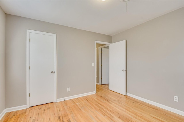 unfurnished bedroom with light hardwood / wood-style floors