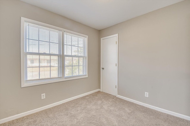 view of carpeted spare room