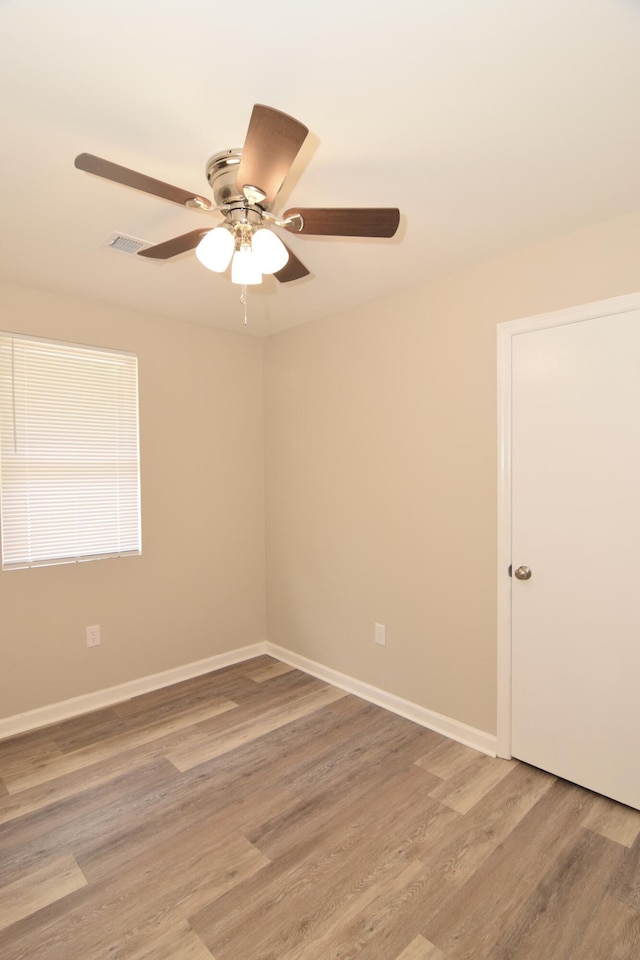 3516 Gardenbrook Dr, Augusta, GA 30906 - spare room with light wood-style flooring, a ceiling fan, and baseboards