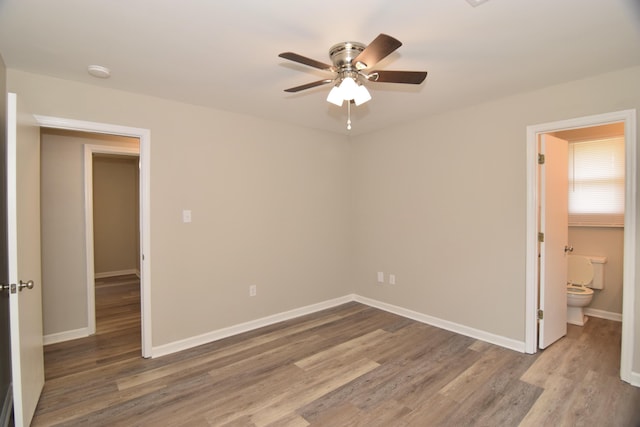3516 Gardenbrook Dr, Augusta, GA 30906 - unfurnished bedroom with wood finished floors, baseboards, ceiling fan, and ensuite bath