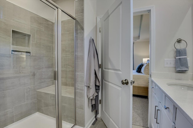 full bathroom featuring a stall shower, ensuite bath, and vanity