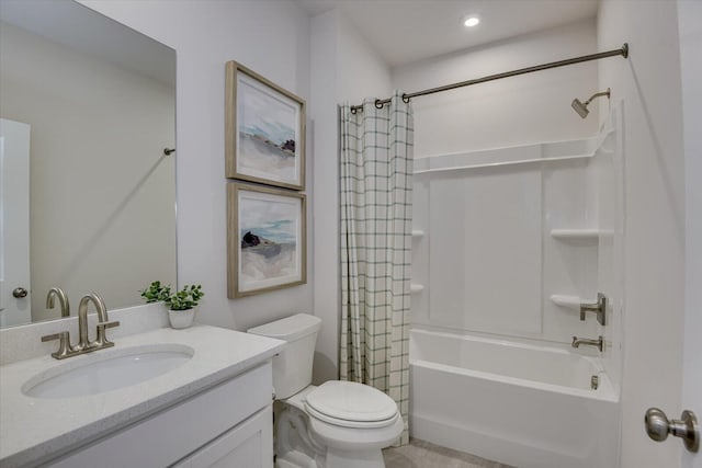 bathroom featuring vanity, toilet, and shower / tub combo with curtain