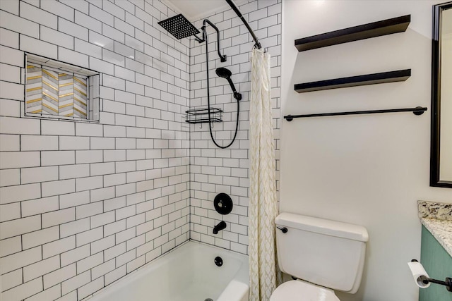 bathroom featuring vanity, shower / bath combination with curtain, and toilet