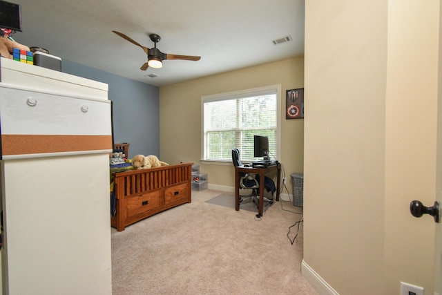 carpeted bedroom with ceiling fan