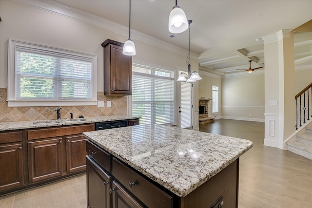 1037 Dietrich Ln, North Augusta, SC 29860 - kitchen featuring a sink, light wood-type flooring, ceiling fan, ornamental molding, and open floor plan