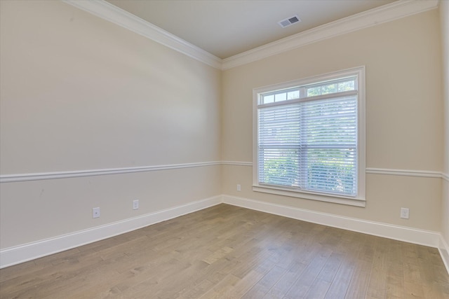 1037 Dietrich Ln, North Augusta, SC 29860 - spare room featuring baseboards, wood finished floors, and ornamental molding