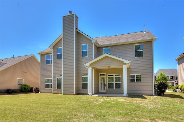1037 Dietrich Ln, North Augusta, SC 29860 - back of property with a patio, a yard, and a chimney