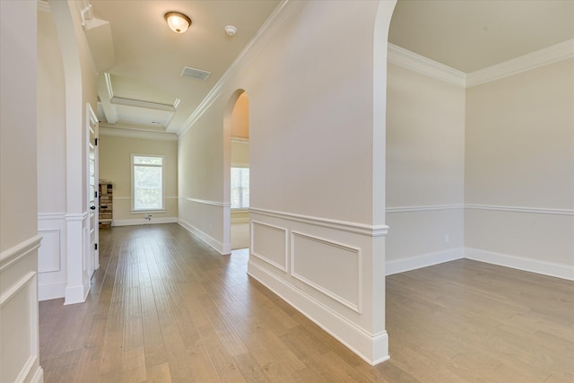 1037 Dietrich Ln, North Augusta, SC 29860 - hall with arched walkways, ornamental molding, and wood-type flooring