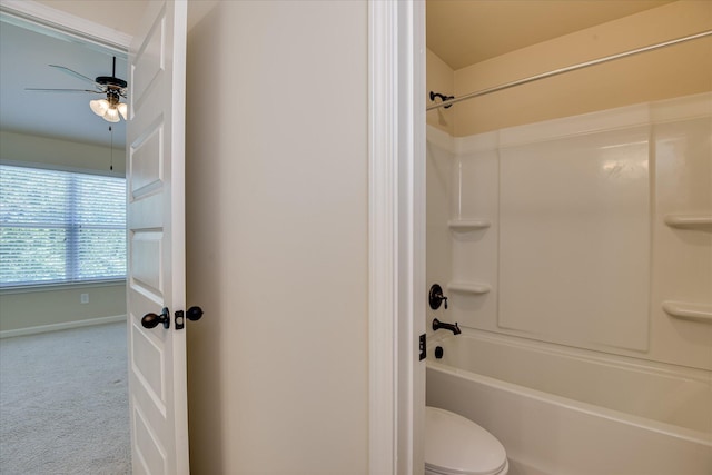 1037 Dietrich Ln, North Augusta, SC 29860 - bathroom featuring shower / washtub combination, toilet, a ceiling fan, and baseboards